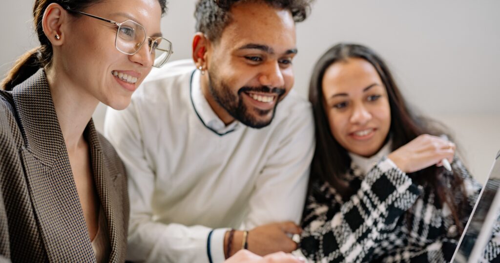 Diverse group of young managers working together