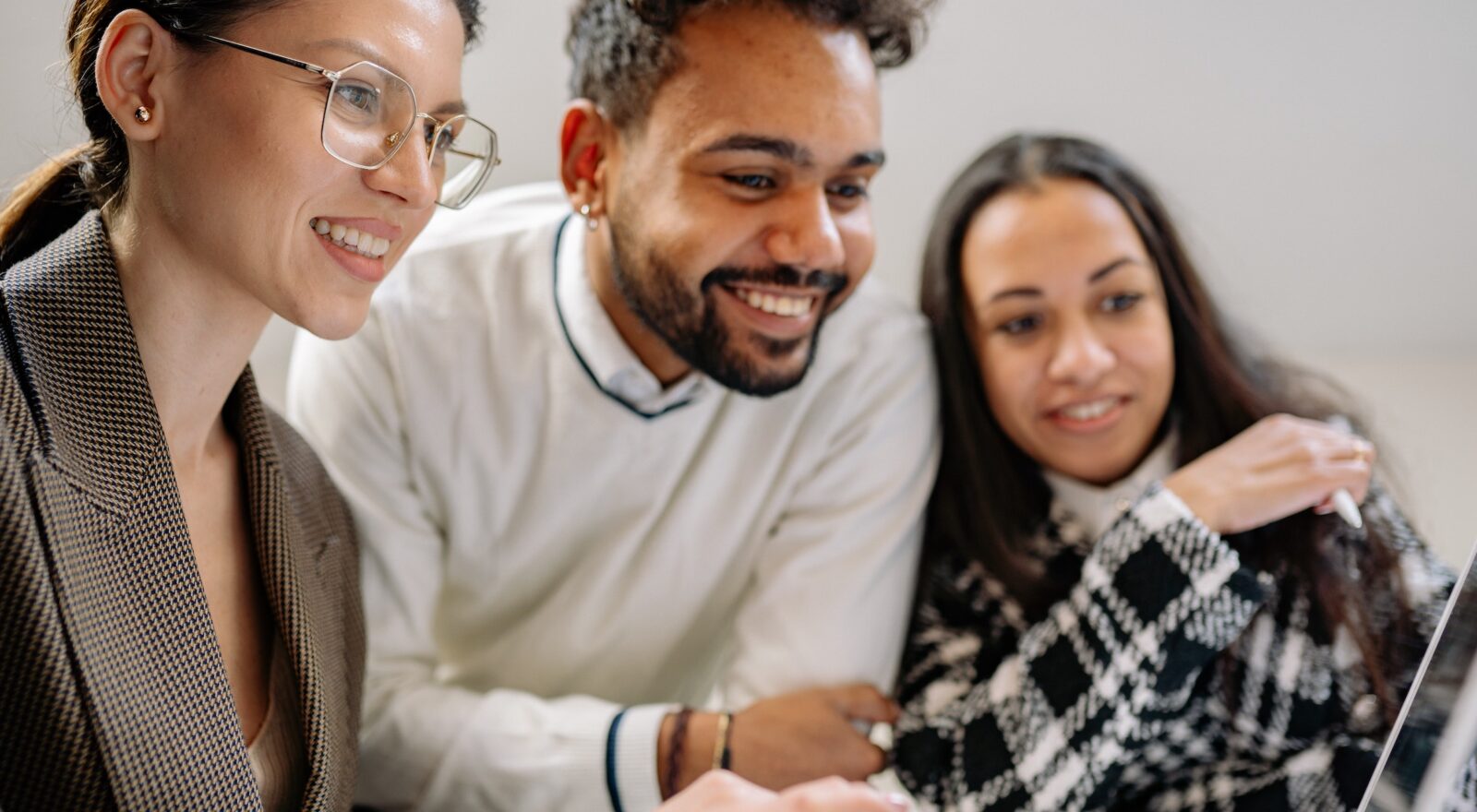 Diverse group of young managers working together