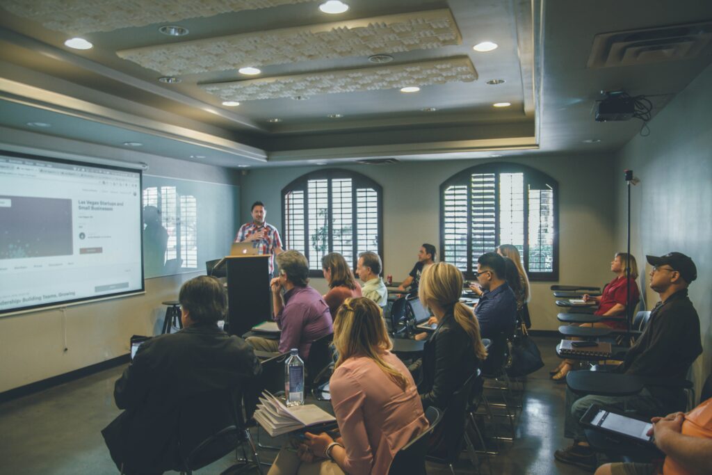 A group of professionals gathers for a corporate training